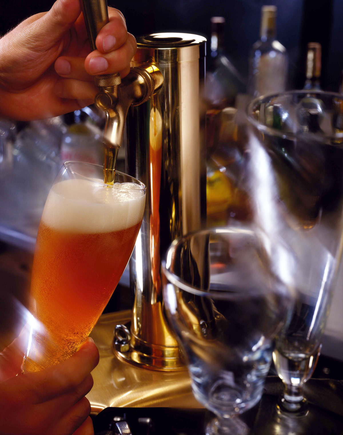 Beer poured from a tap